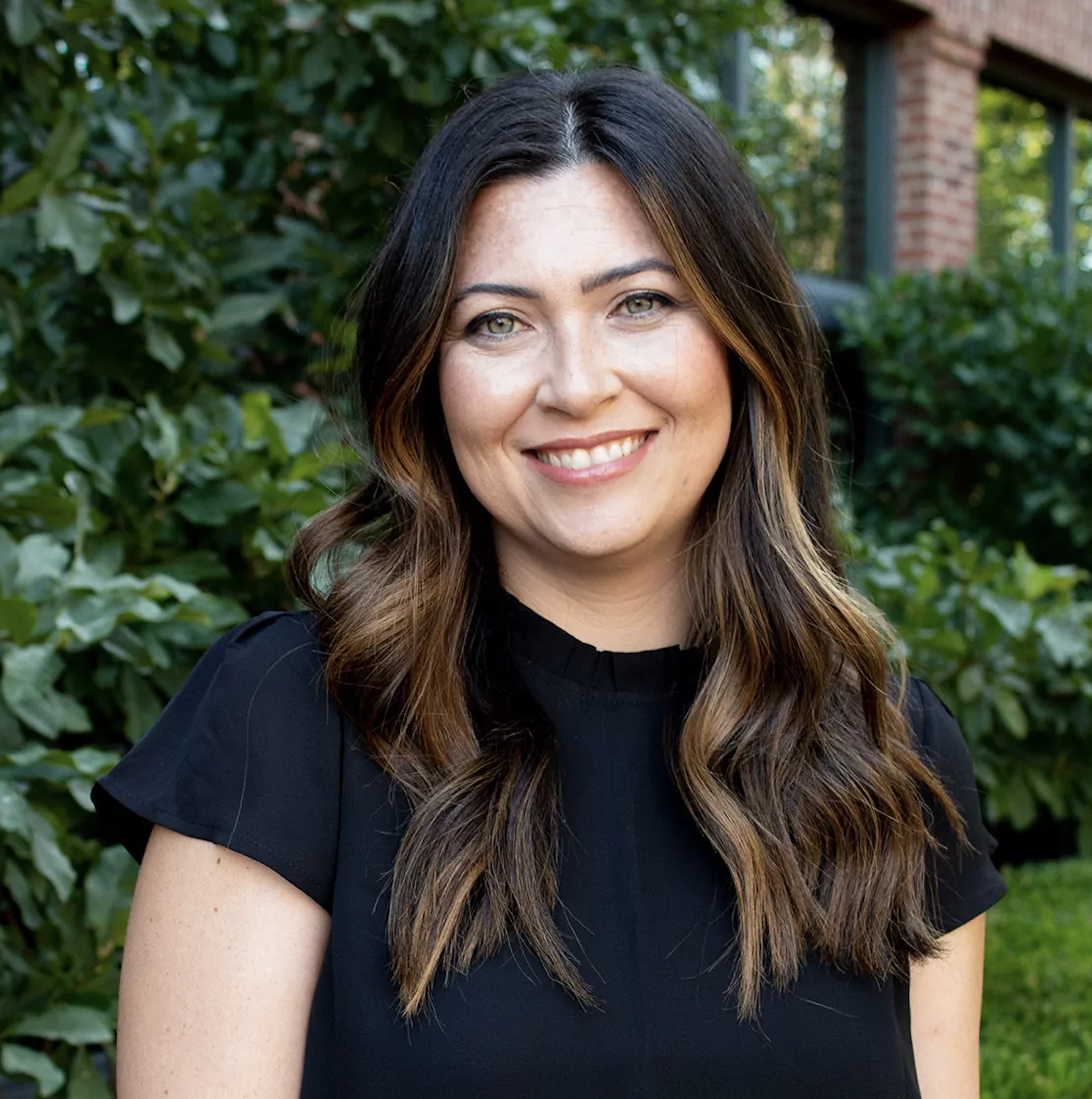 a woman smiling for the camera