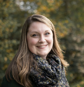 a woman smiling for the camera