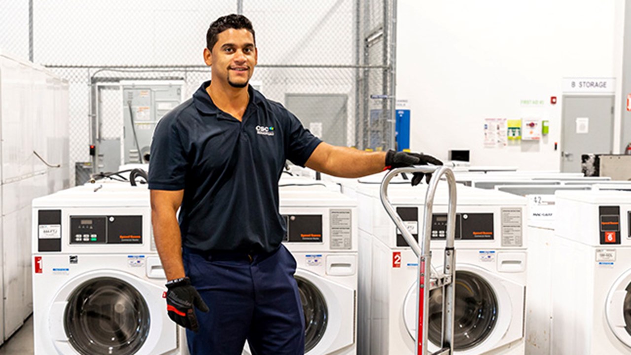 Service Tech insalling machines 