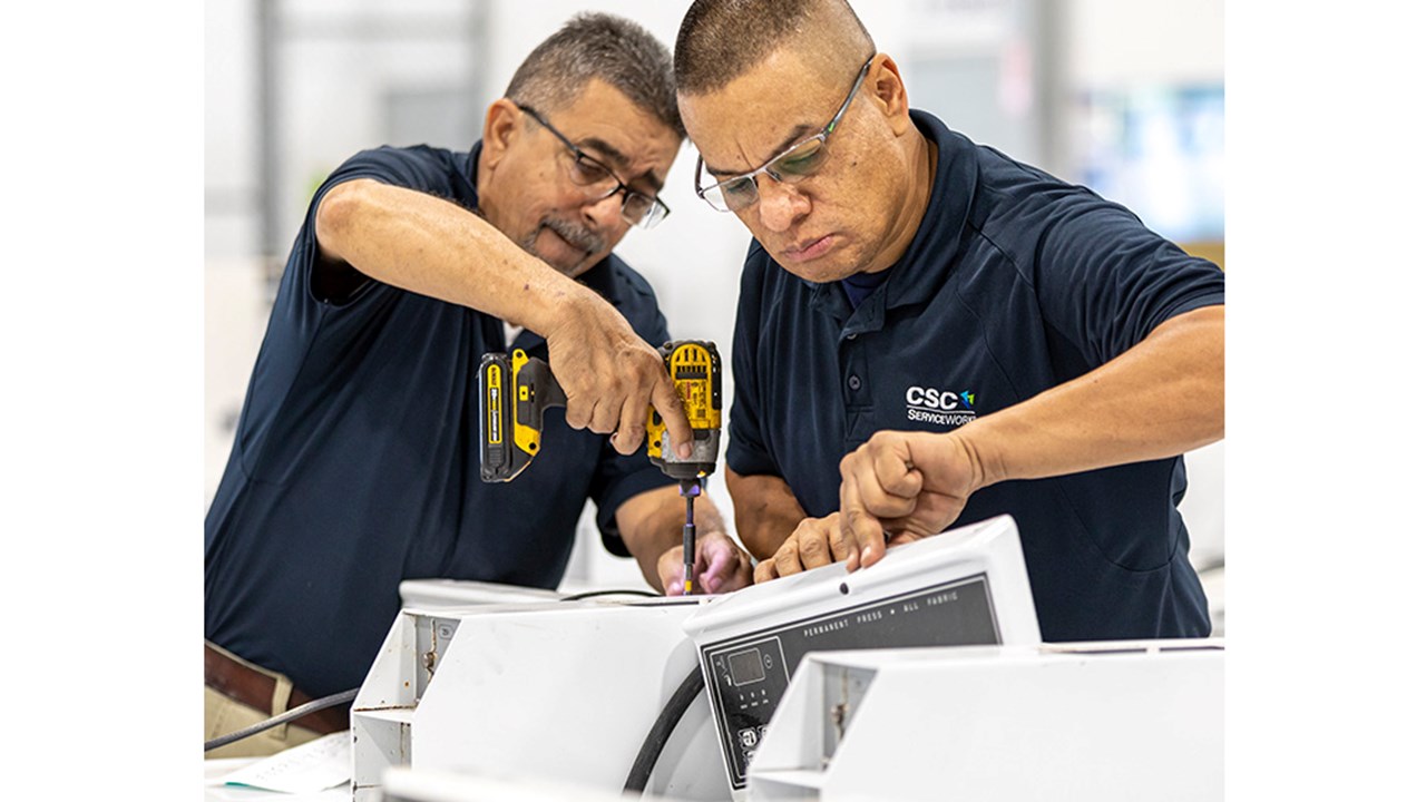 Service Techs Working on Machine 