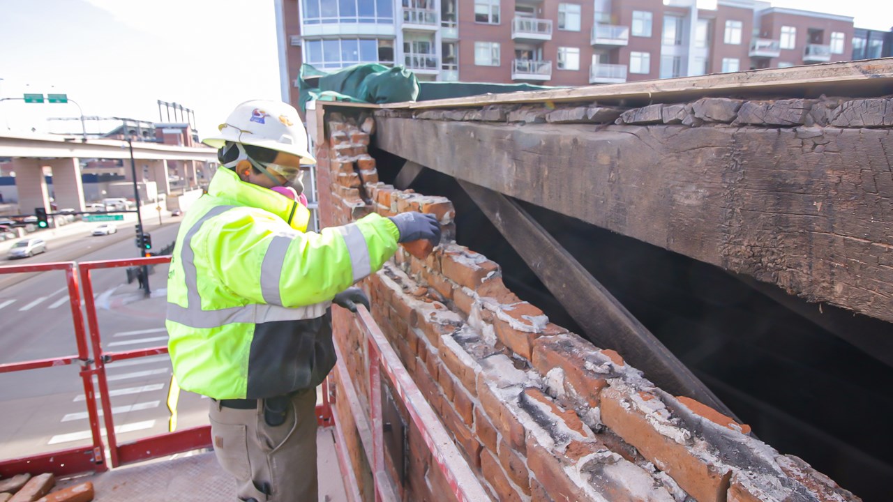 Historic restoration division performing masonry repairs to the historic Hose House