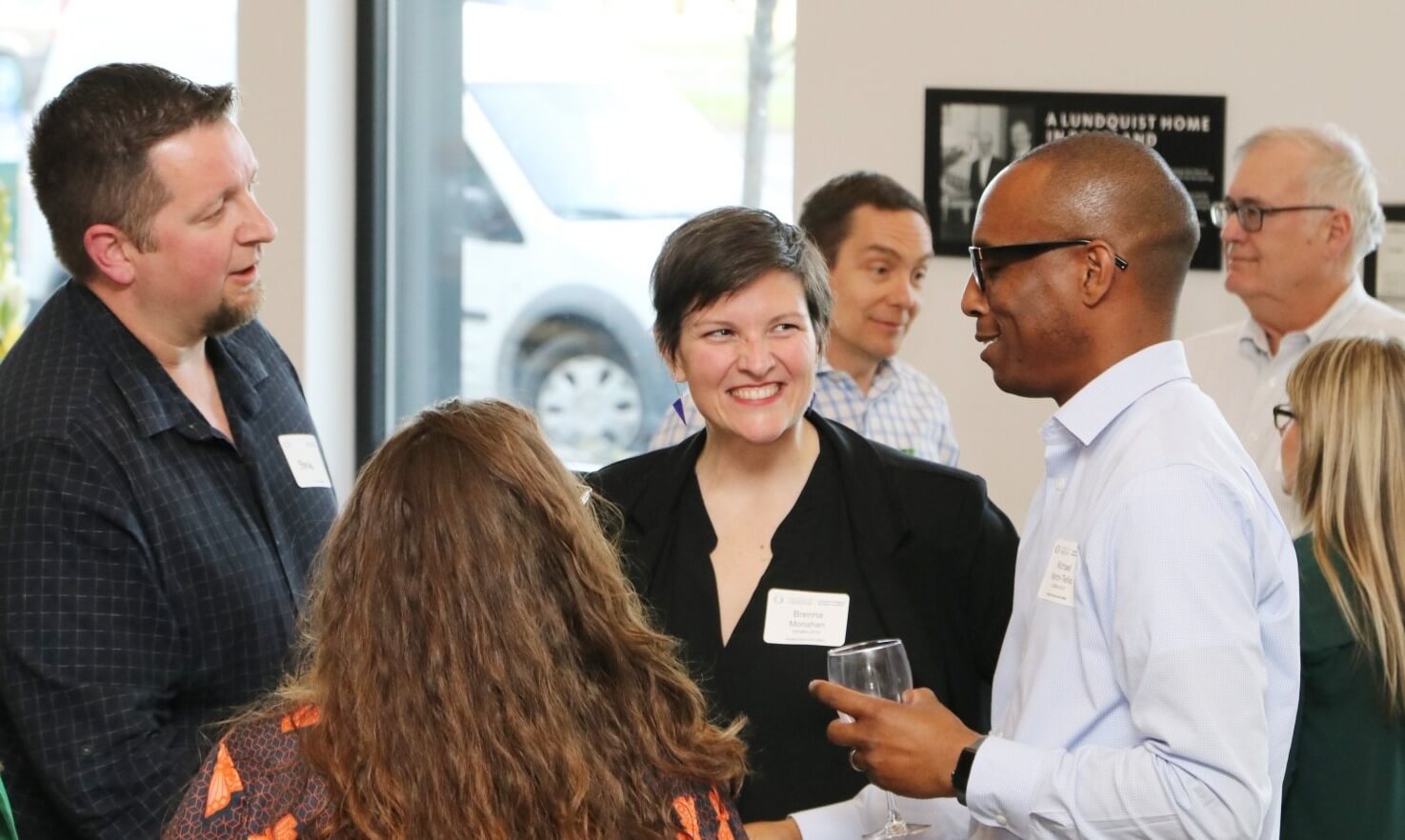 People at smiling at networking event