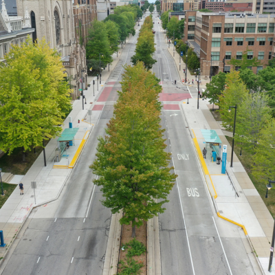 A city block with bus rapid transit lanes.