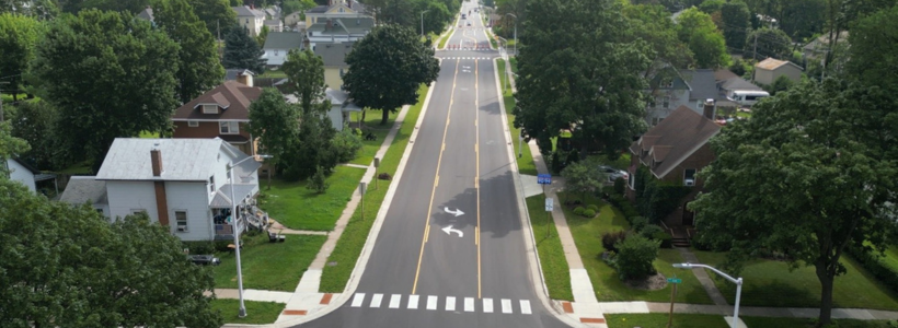 The addition of a two way left turn lane improves safety and operations.