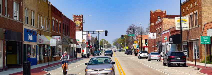 Reconstructed roadway in Racine provides safe access to businesses via car, bike, or foot.