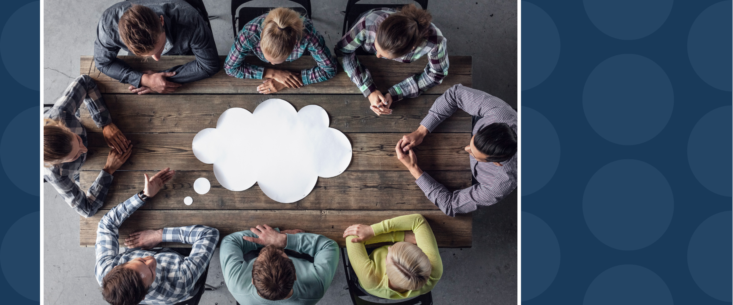 People sitting around a table talking at a meeting