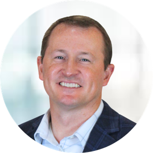 Board Chair Ellery Schaffer smiling in corporate headshot photo