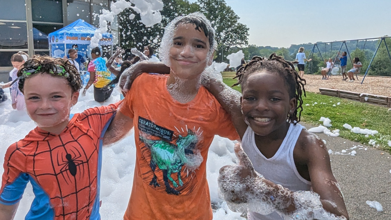 Center School Student's enjoying a foam party at the end of camp. 