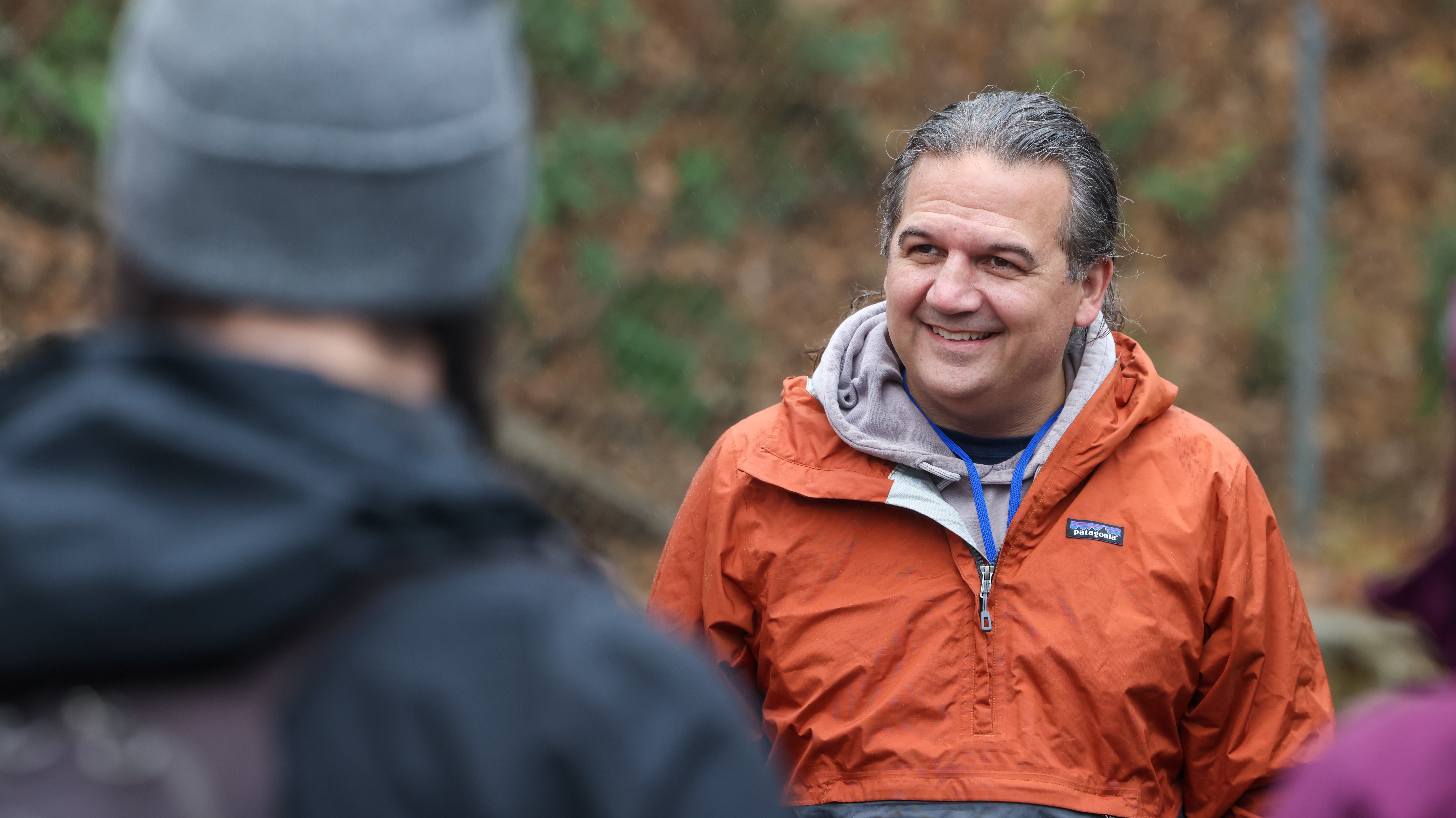 person talking, smiling