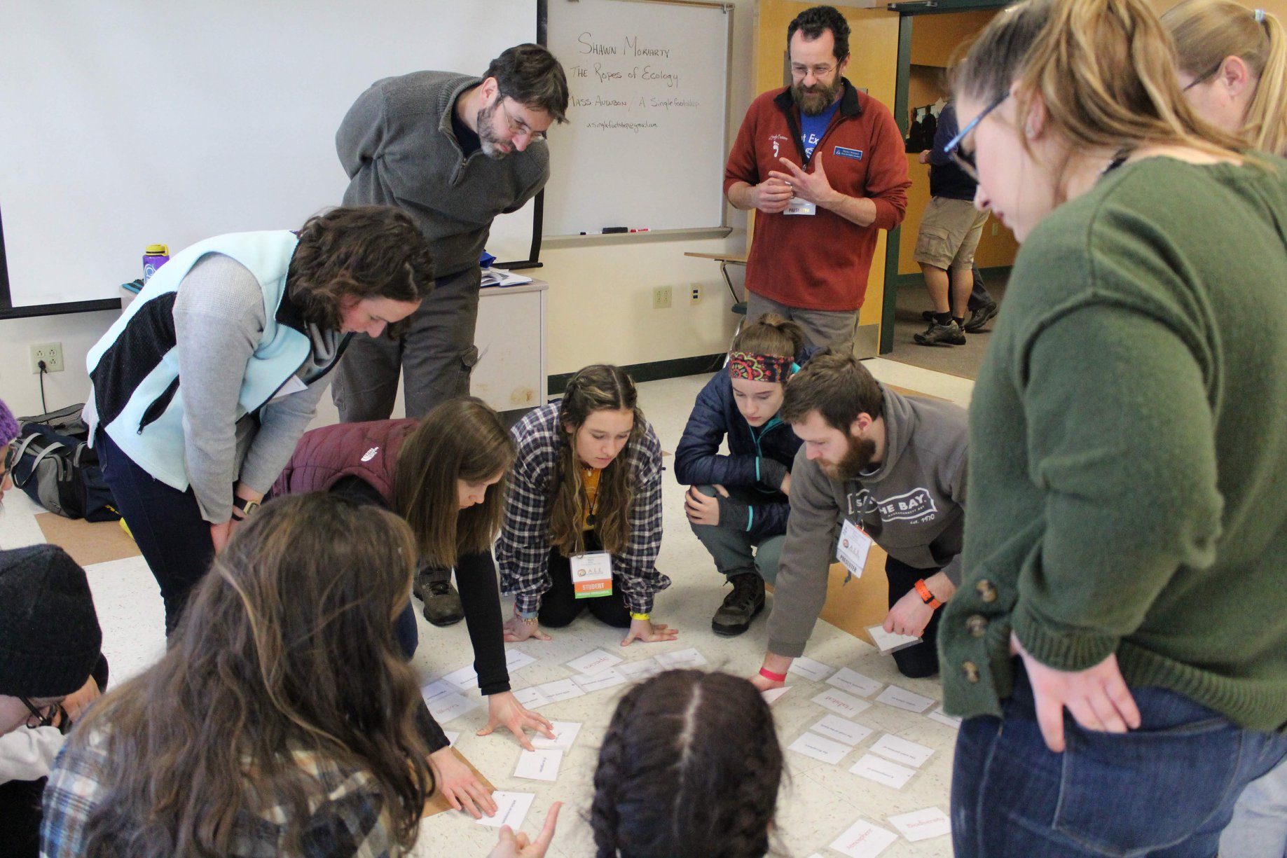 people kneeling down during a workshop