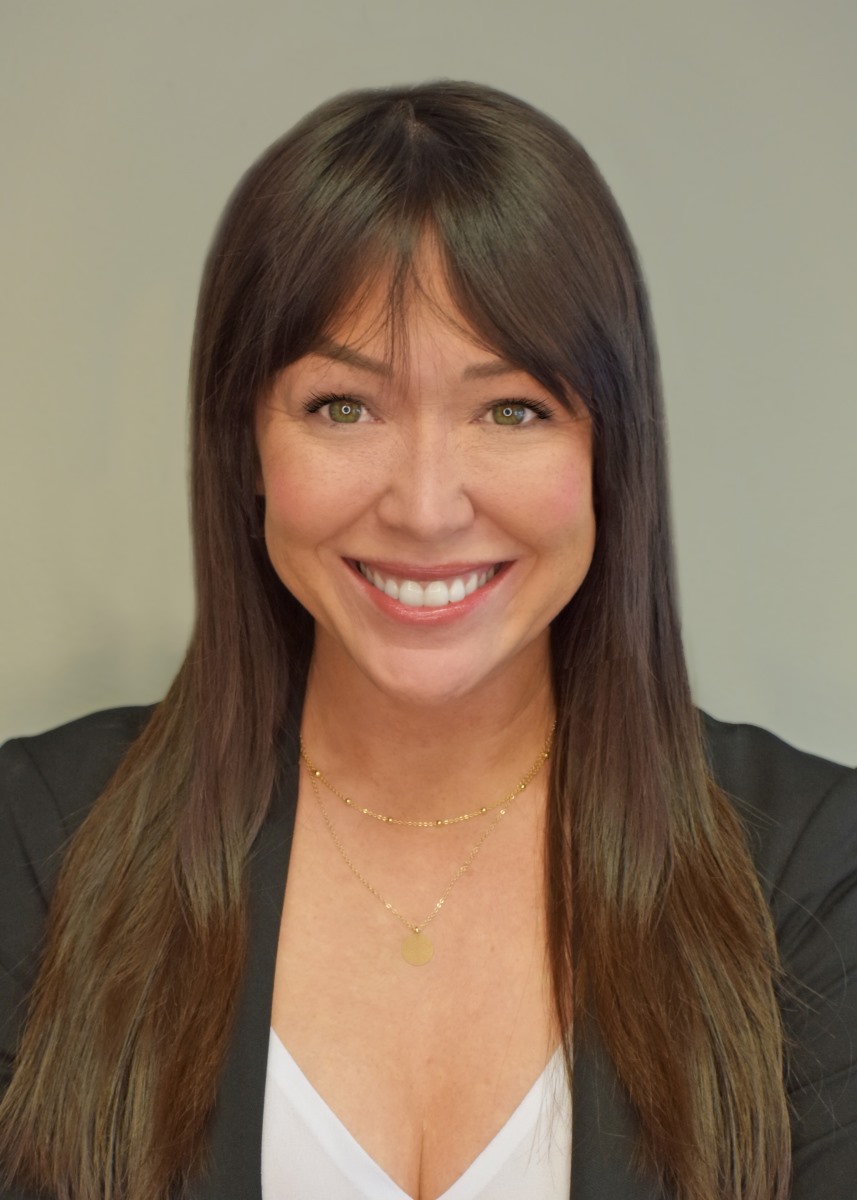 A person smiling at the cameraAI-generated content may be incorrect.