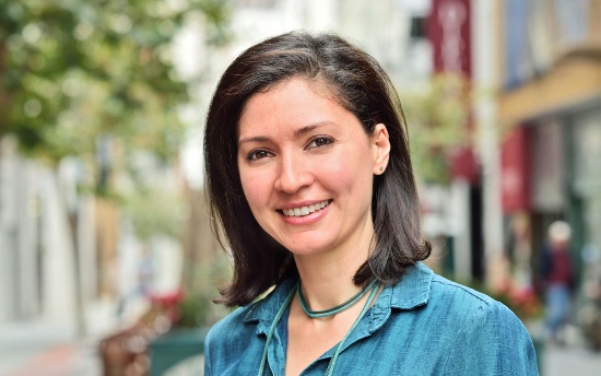 A person smiling at the cameraAI-generated content may be incorrect.