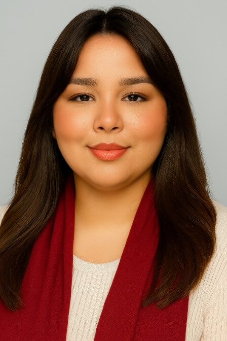 A person with long hair and a red scarfAI-generated content may be incorrect.