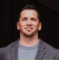 A person in a grey sweaterAI-generated content may be incorrect.