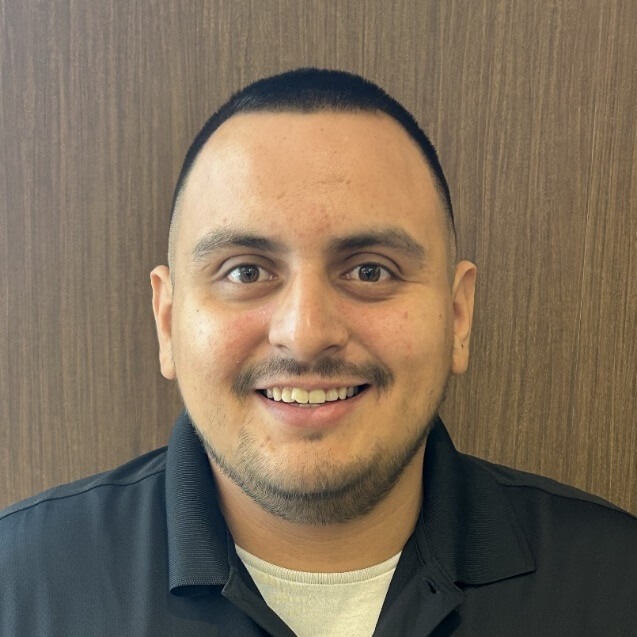 A person smiling for a pictureAI-generated content may be incorrect.