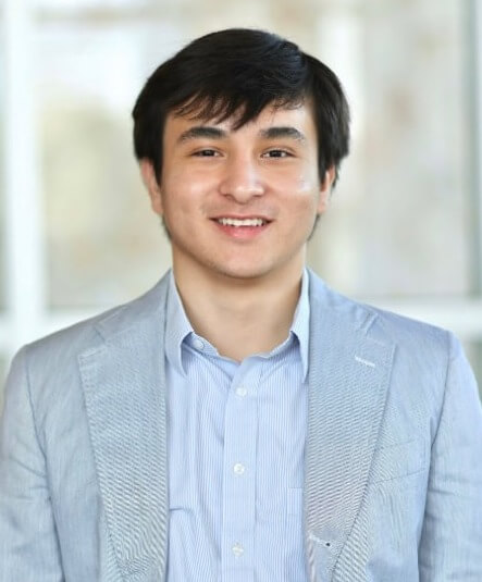 A person in a suitAI-generated content may be incorrect.