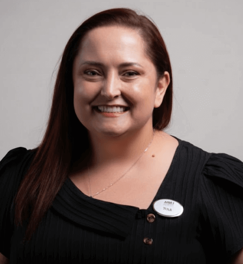 A person smiling at cameraAI-generated content may be incorrect.