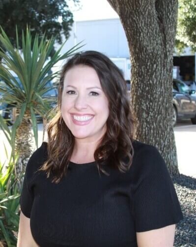 A person smiling at cameraAI-generated content may be incorrect.