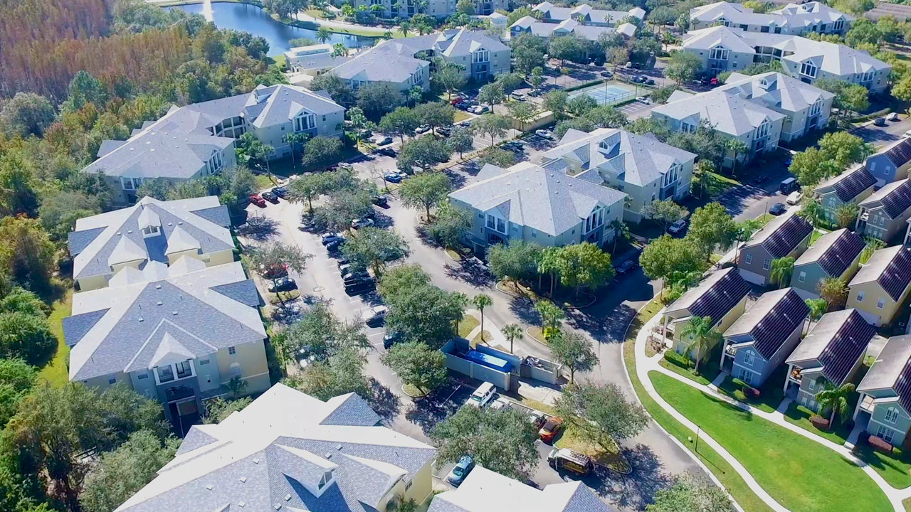 Arbors at Carrollwood - Tile to Shingle Roof Replacement