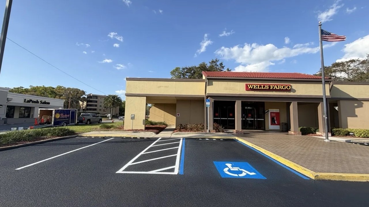 Wells Fargo parking lot sealcoated with new ADA stalls by Radiant Striping, Tampa