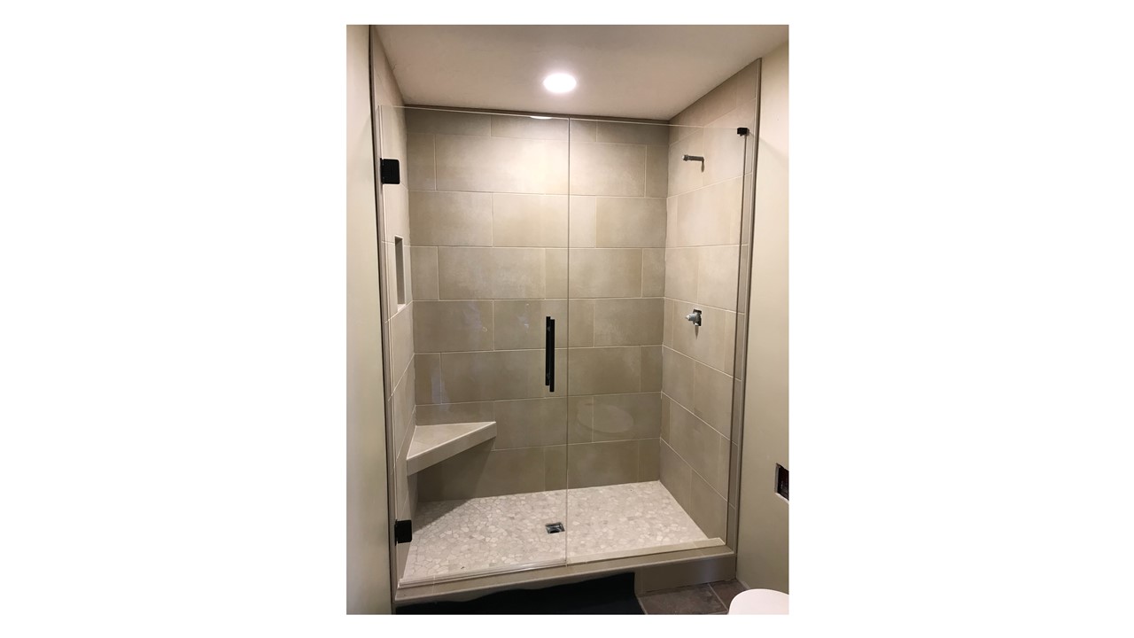 Door with stationary panel 