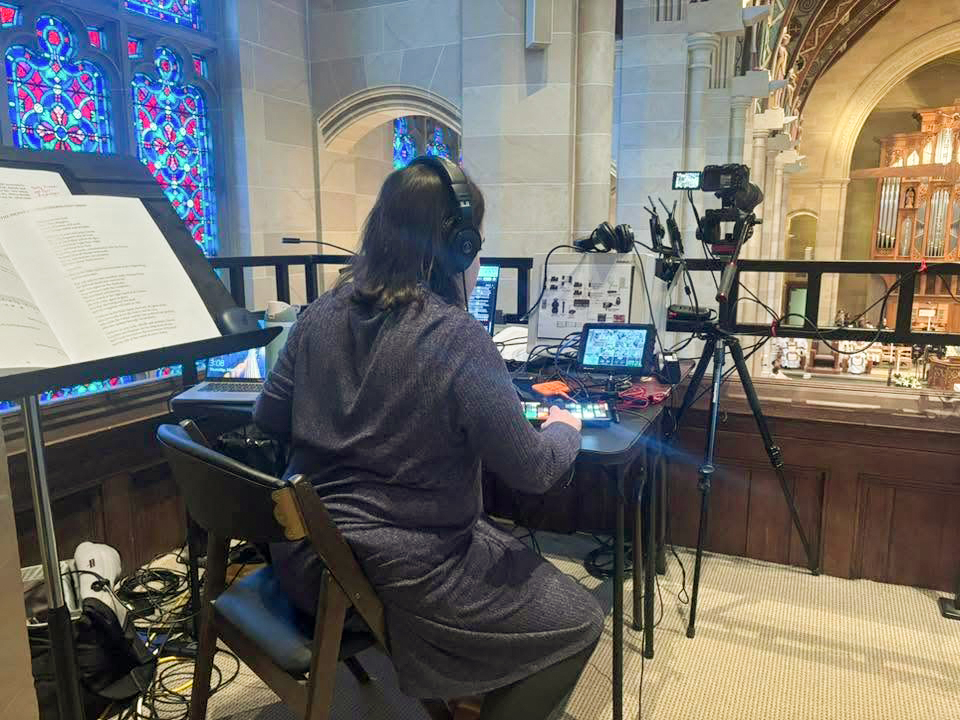 Gina Capellazzi operating camera equipment for a diocesan Mass livestream