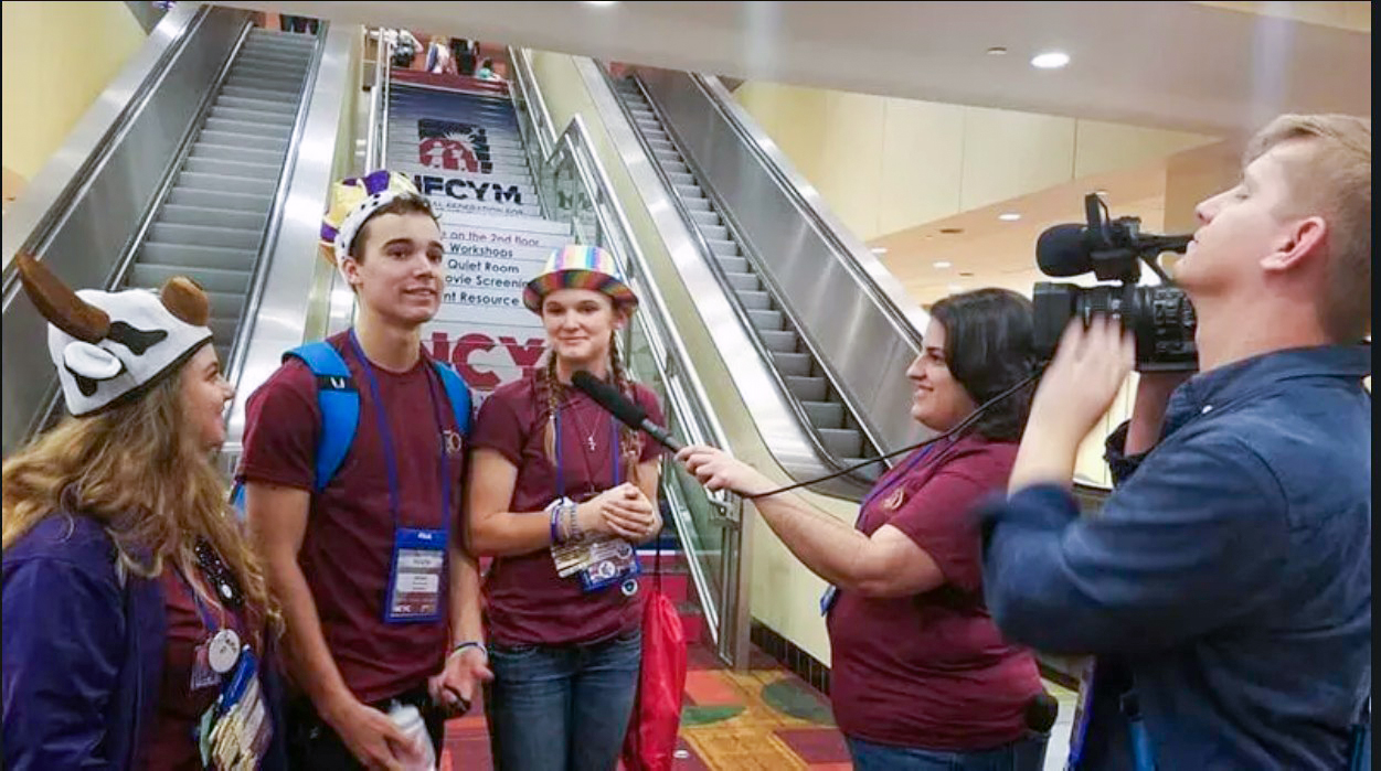 Gina Capellazzi interviewing youth conference participants
