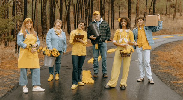 A group of people in yellow and blue outfitsAI-generated content may be incorrect.