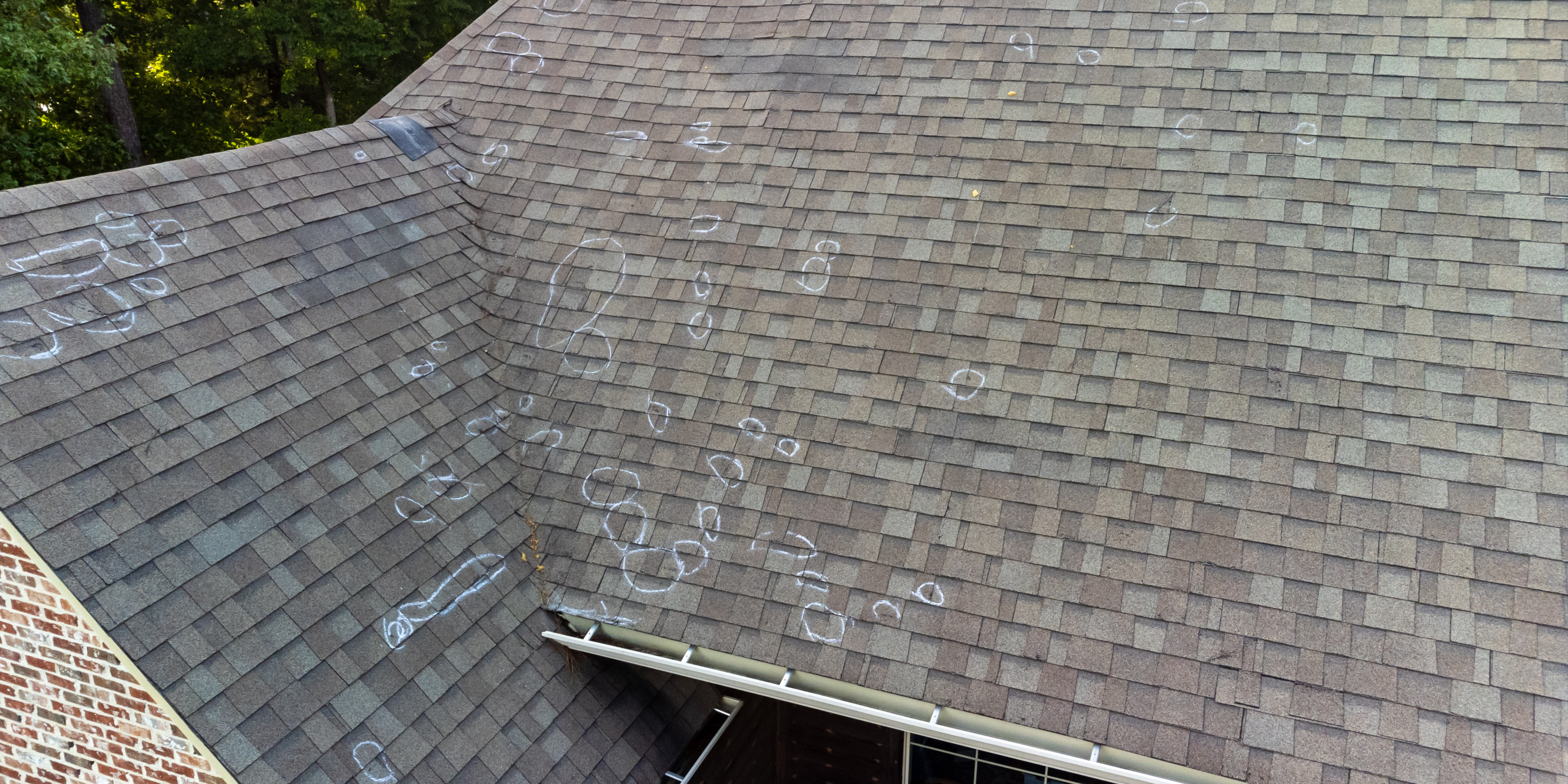 image of whole roof with damage located