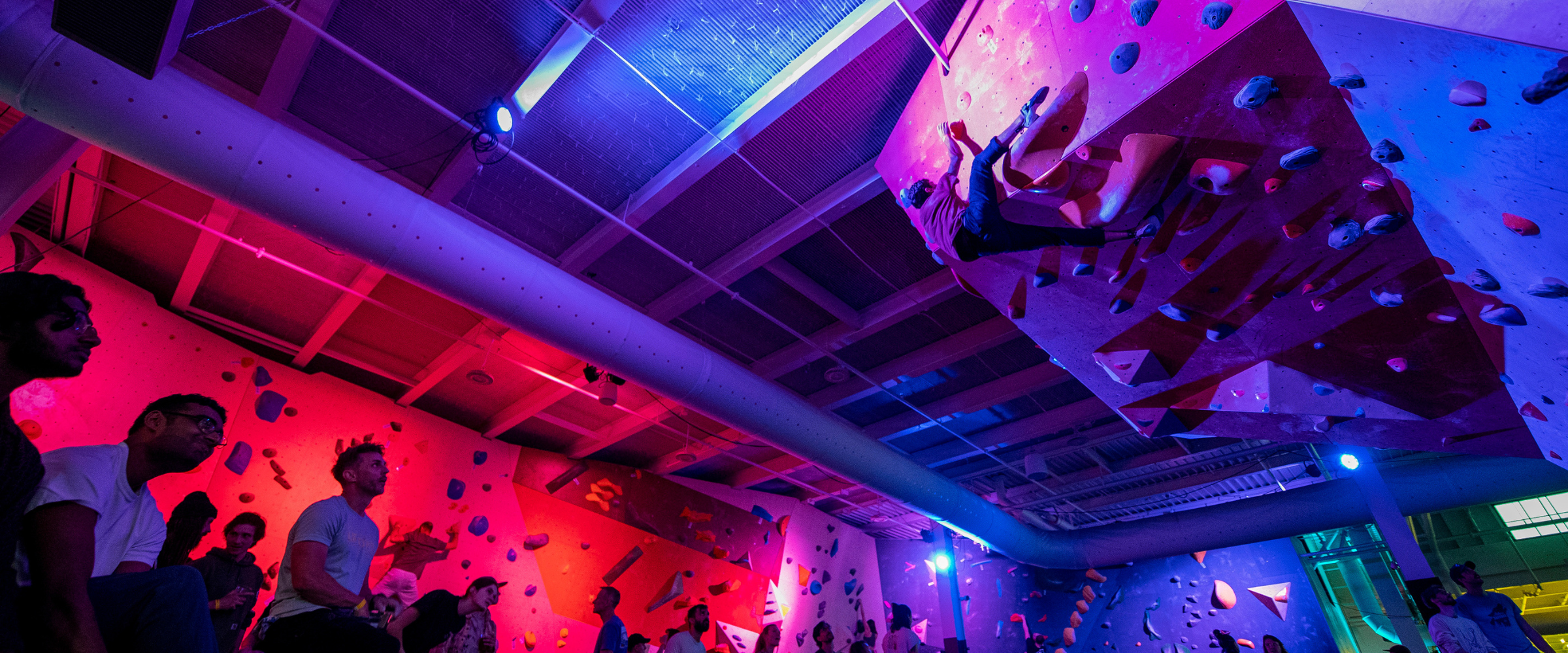 People climbing at indoor climbing gym during CWA Summit