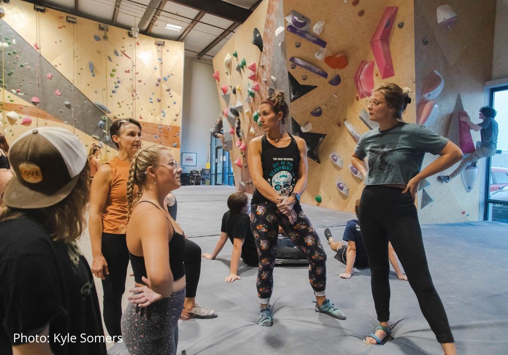 Teaching class at indoor climbing gym