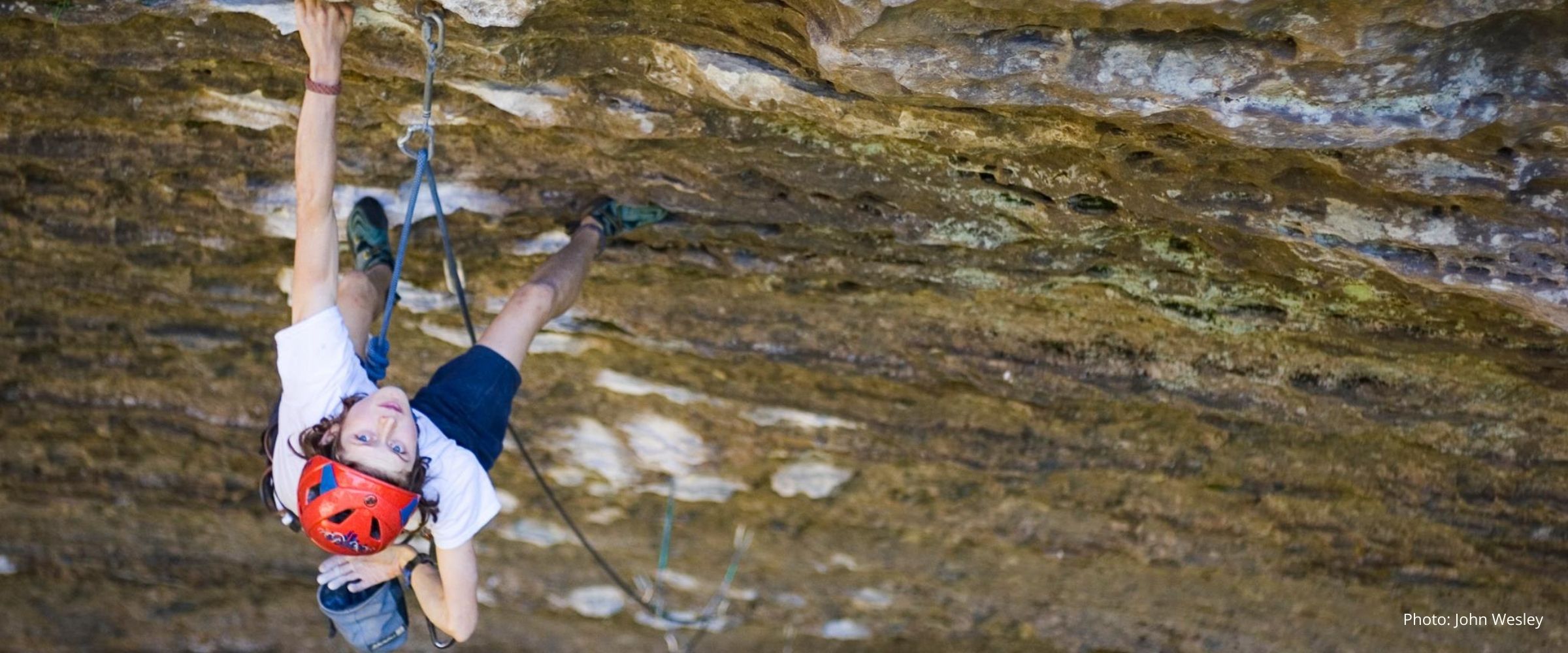 Lor Sabourin rock climbing outside