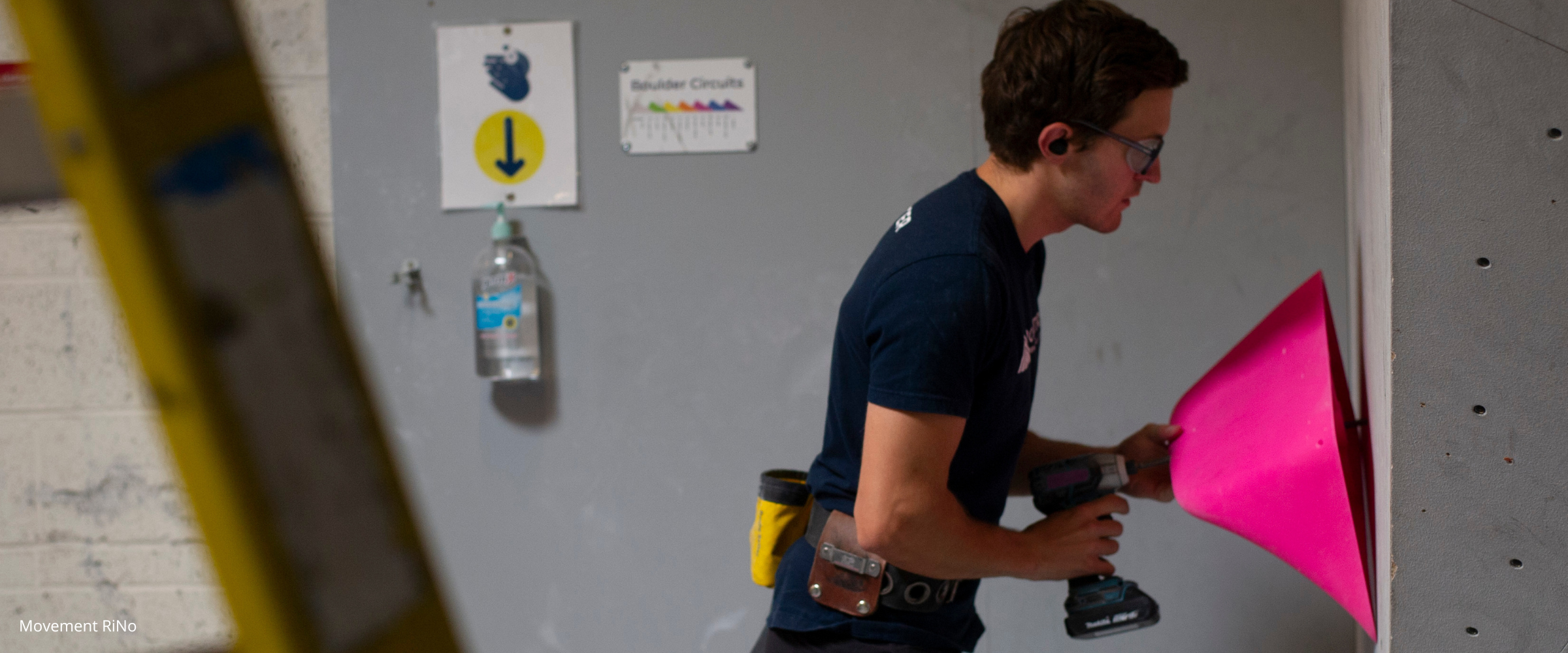 Routesetter in indoor climbing gym