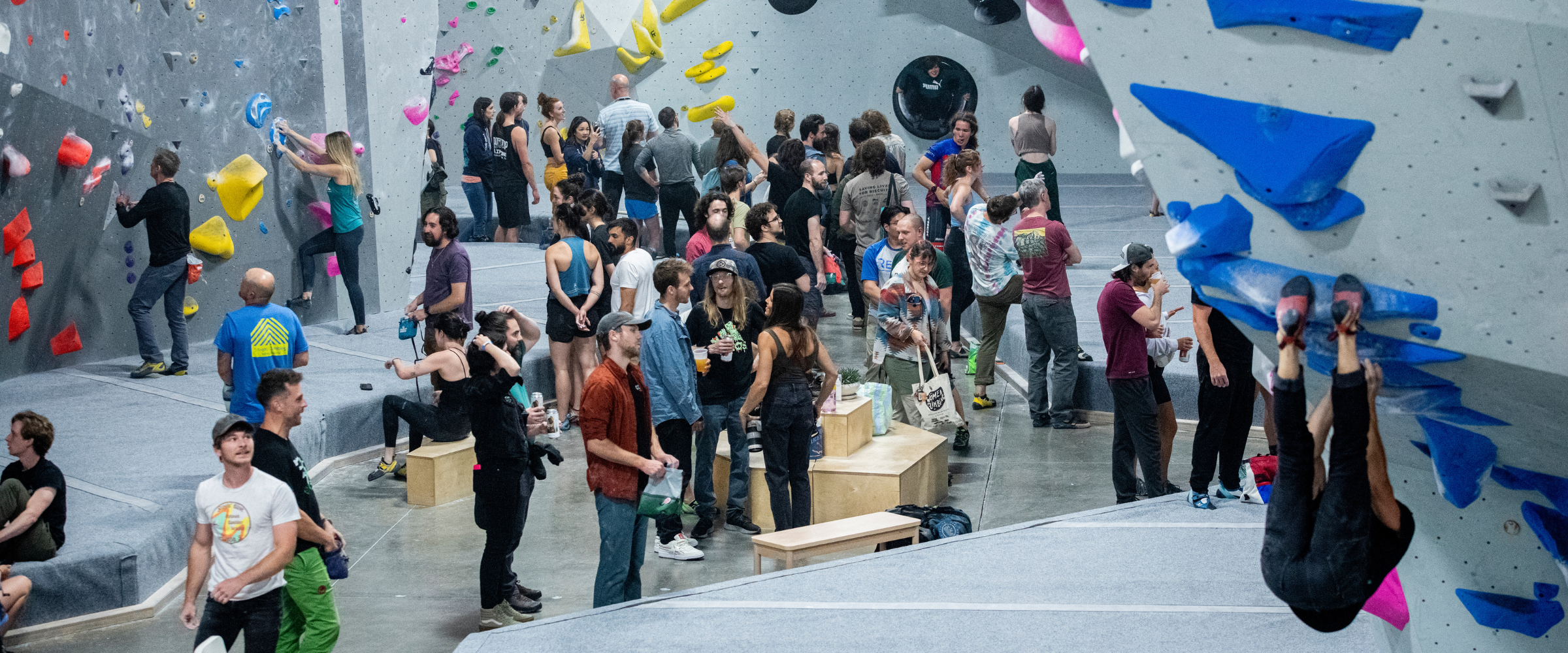 Crowded indoor climbing gym