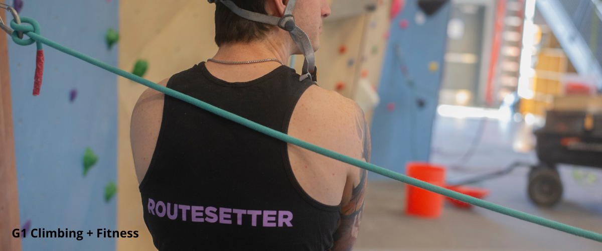 Routesetter in indoor climbing gym