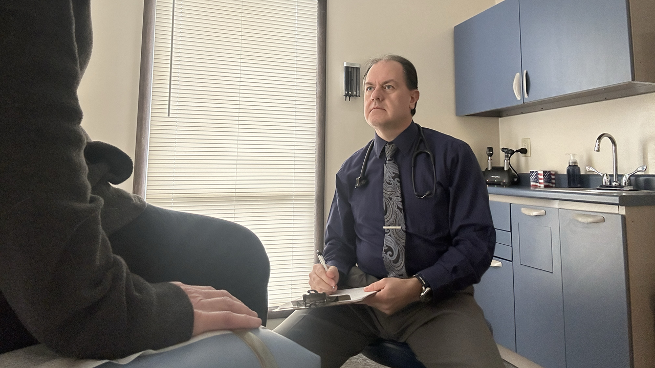 Dr Bailey with a patient