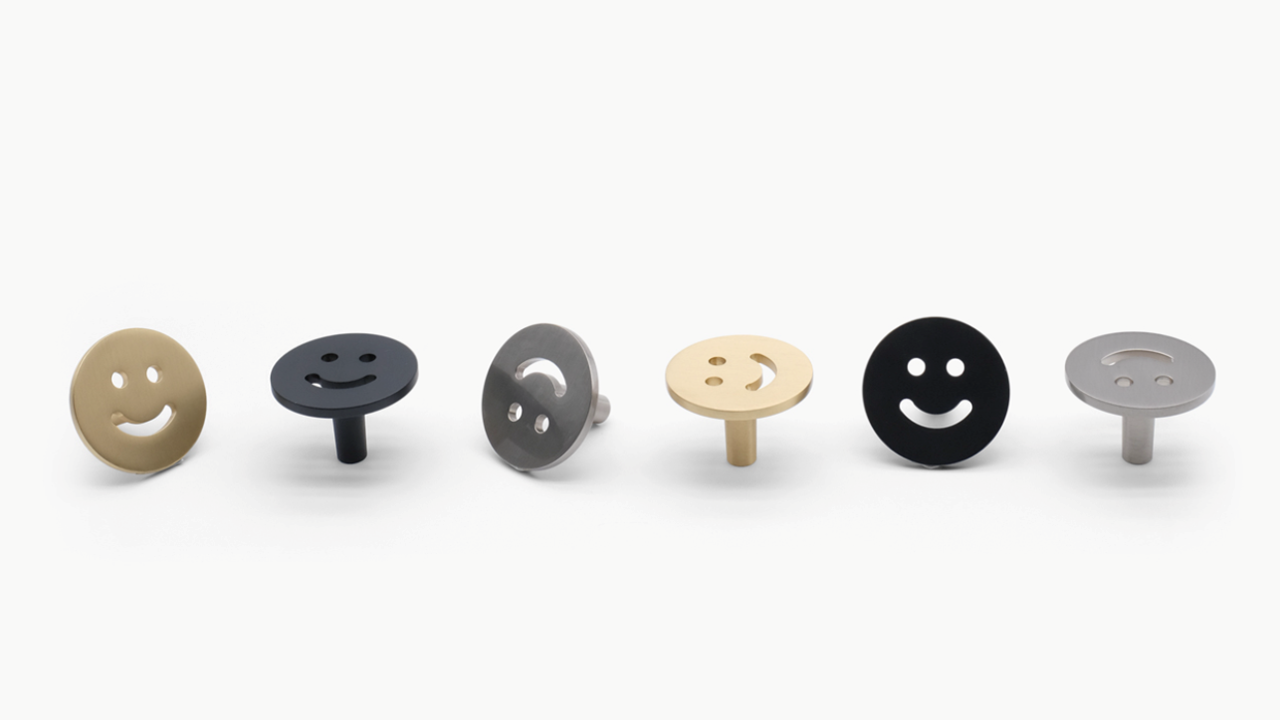 Hapny Smiley cabinet knobs arranged in a line