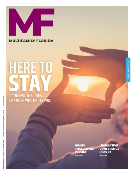 Multifamily Florida magazine cover showing sun shining though a frame made of two hands