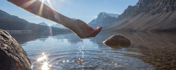 A hand reaching out to waterAI-generated content may be incorrect.