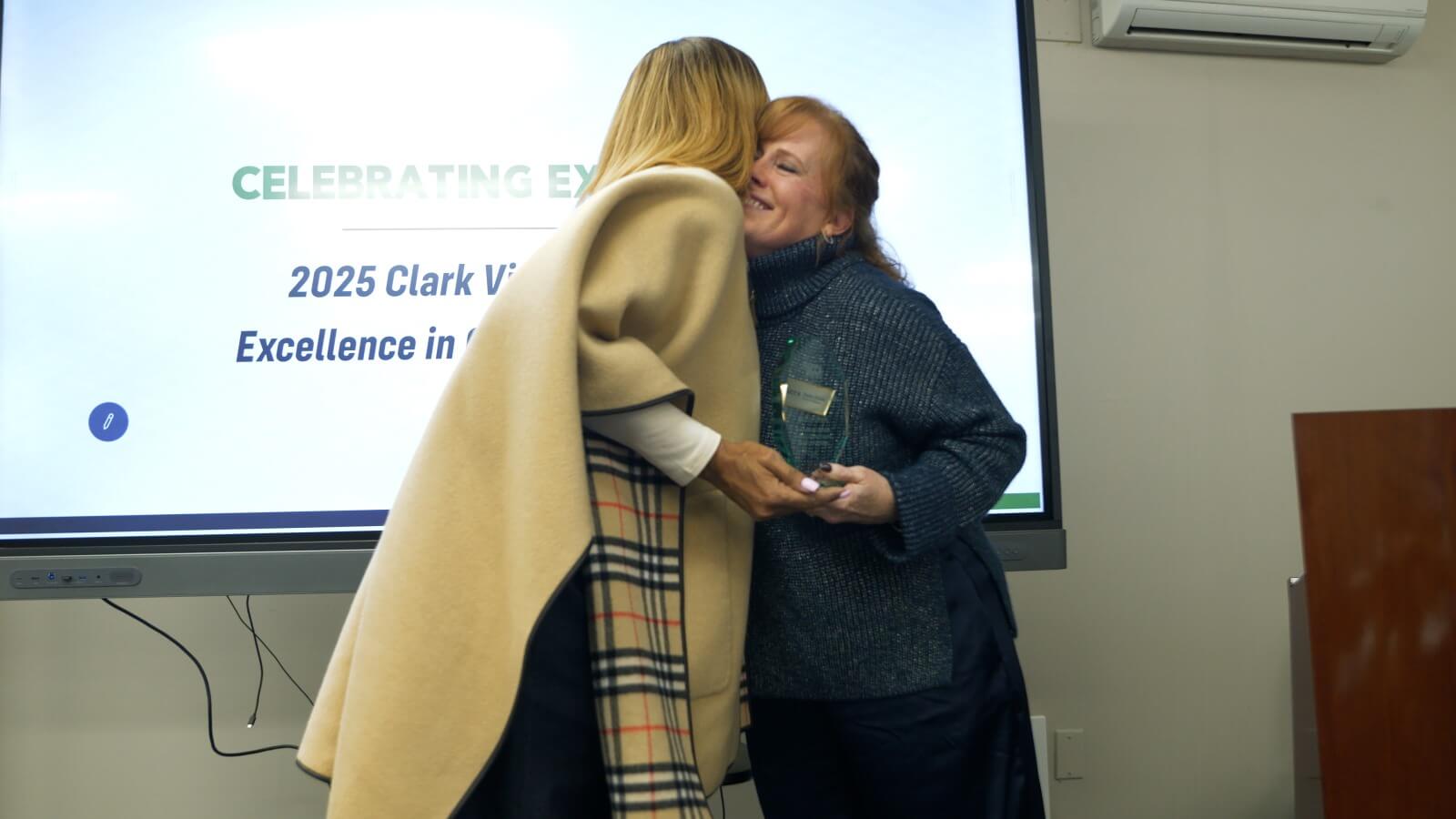 Sasha receiving the 2025 Clark Vinson Award