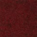 A red carpet with black specksAI-generated content may be incorrect.