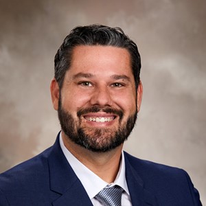 Photo of Dustin Begosh-Mayne MD