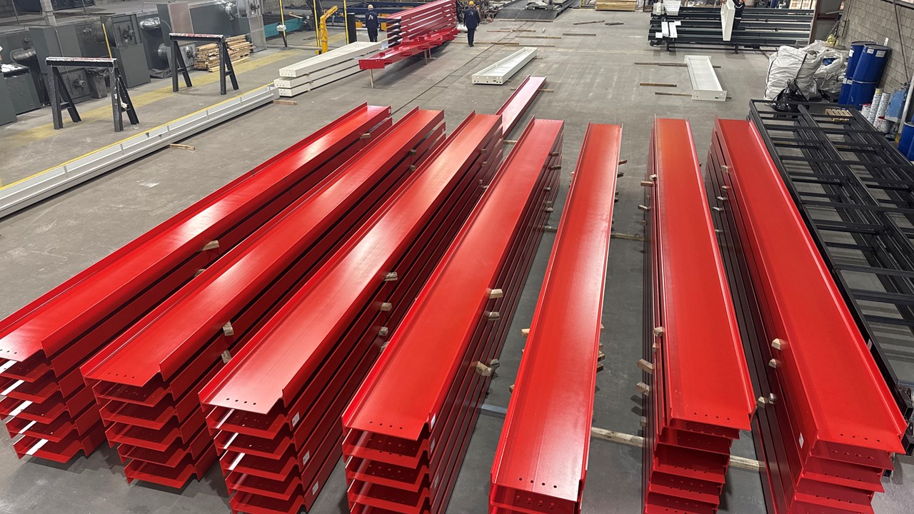 Red Finish Coat on Steel Building Beams