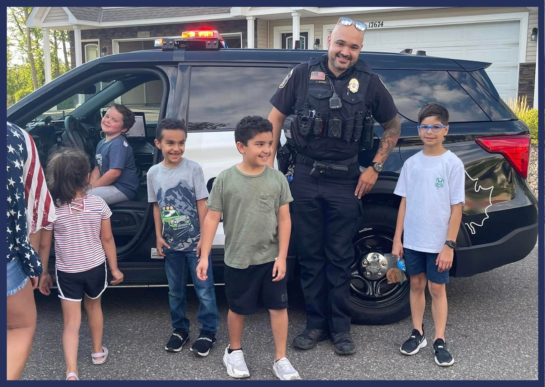 Police officer with children