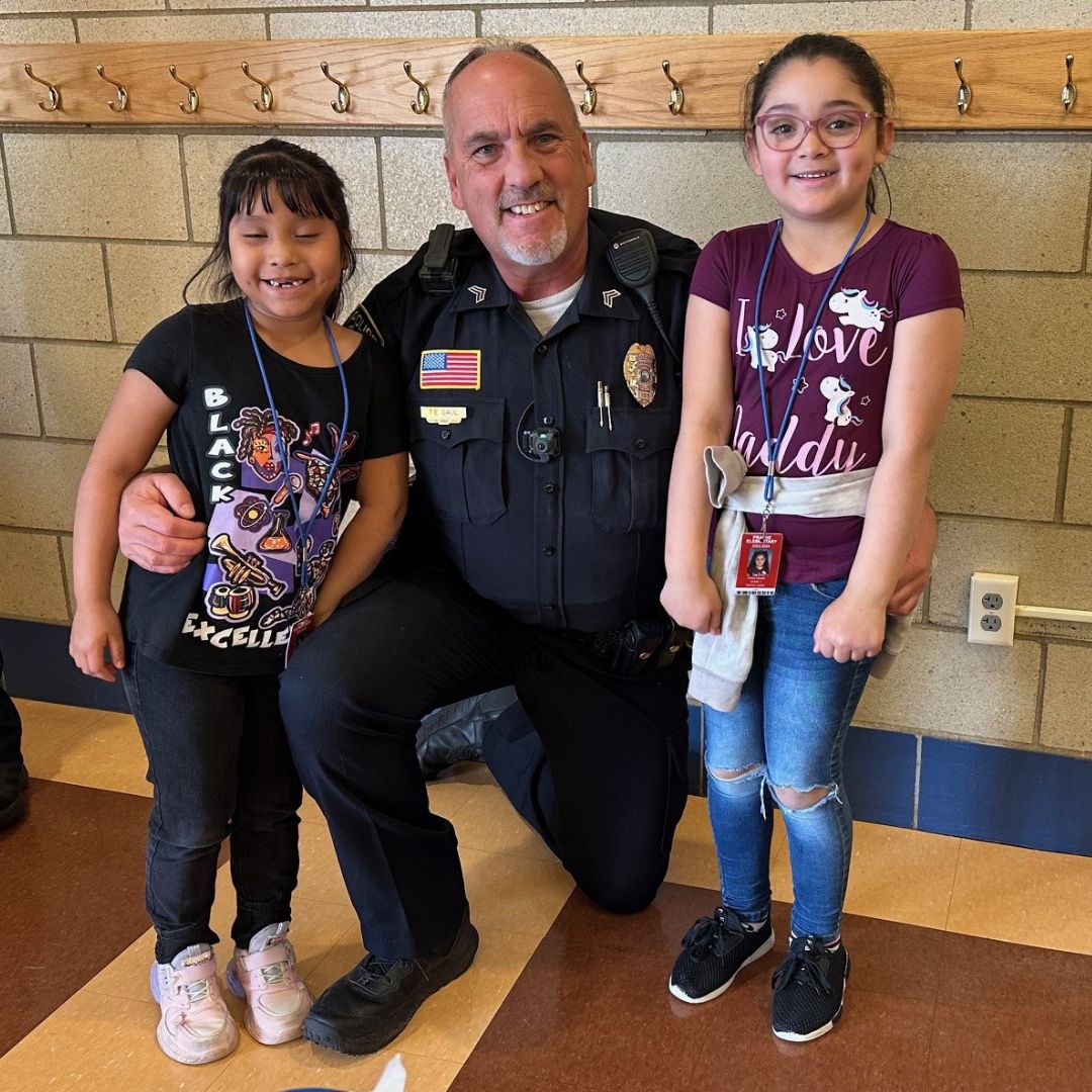 Officer with two kids.