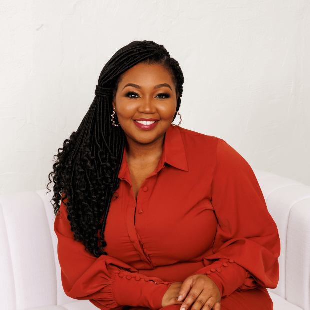 A person in a red dressAI-generated content may be incorrect.