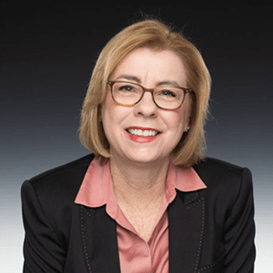 A person wearing glasses and a black jacketAI-generated content may be incorrect.