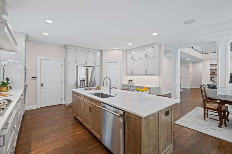 A kitchen with a large islandAI-generated content may be incorrect.