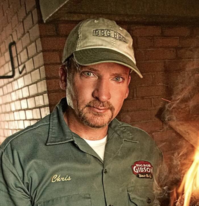 Chris Lilly tending the fire at Nashville Fire and Flavor