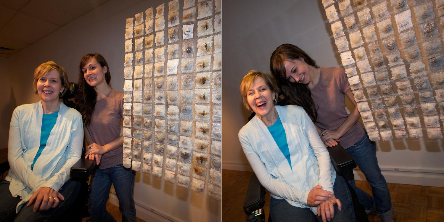 Two square images side by side. Both images have two white women, one in a wheelchair (Jill, Megan's Mom) and one standing (Megan). They are close together, laughing and smiling, near a hanging piece of art that is comprised of small, off-white squares. 